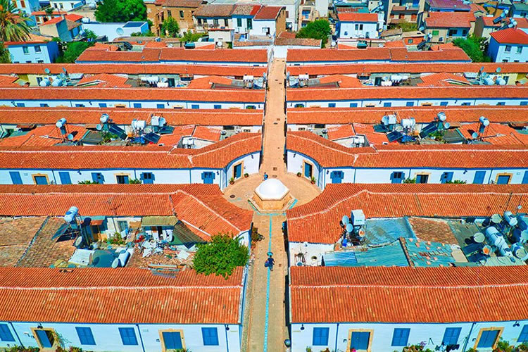 <p>Samanbahce, Nicosia, North Cyprus.  A mid-20th century social housing experiment. Drone-view. (<a href='https://www.designboom.com/architecture/alp-galip-captures-cyprus-first-social-housing-complex-samanbahce-07-17-2021'>See: https://www.designboom.com/architecture/alp-galip-captures-cyprus-first-social-housing-complex-samanbahce-07-17-2021</a>)   (Photo by Alp Galip for Designboom.com)</p>
